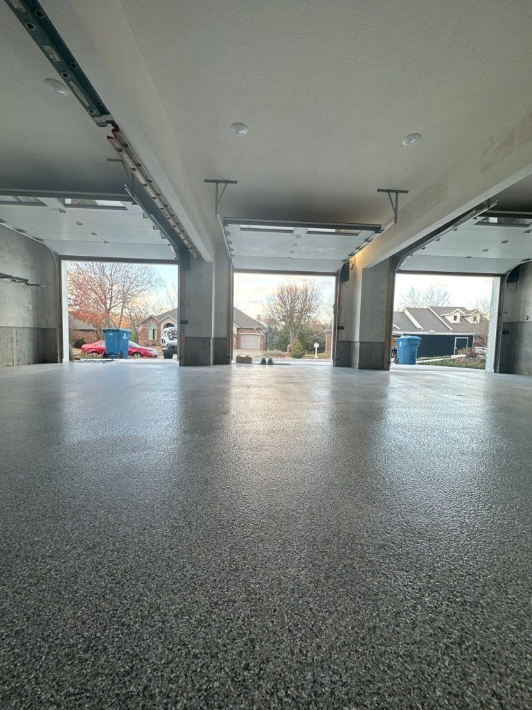Chip-flake concrete coating on residential garage slab